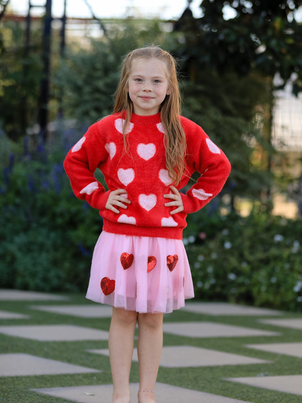 Valentine's Day girls pullover sweater in pink with heart design, perfect for cozy and festive occasions.