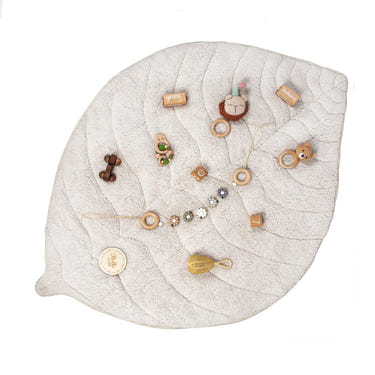 Leaf-shaped pearl baby playmat made of soft sherpa and cotton, perfect for playtime and tummy time.