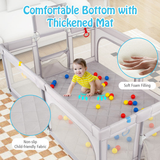Extra large light gray baby playpen with basketball hoop for toddlers, angled view showcasing its spacious design.