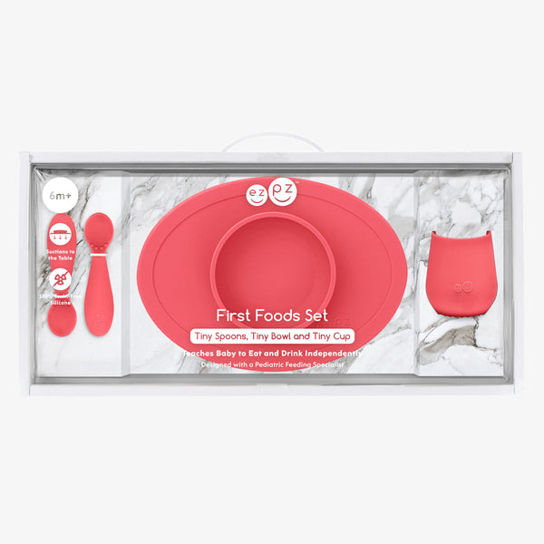 "First Foods Set for babies, featuring colorful utensils and bowls, perfect for introducing solid foods."