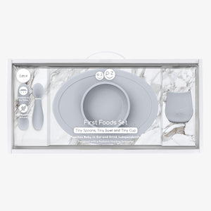 "First Foods Set for babies, featuring colorful bowls, spoons, and accessories for easy feeding."
