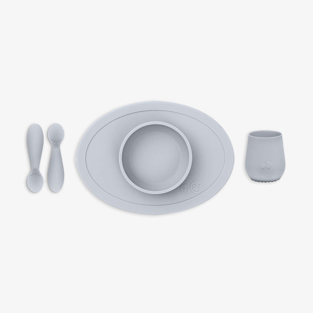 "First Foods Set for babies, featuring colorful bowls, spoons, and accessories for easy feeding."