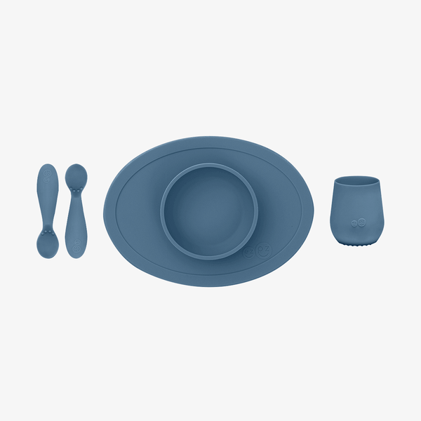 "First Foods Set for babies, featuring colorful bowls and utensils, perfect for introducing solids at angle 17."