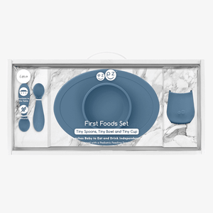 "First Foods Set for babies, featuring colorful utensils and bowls, perfect for introducing solid foods."