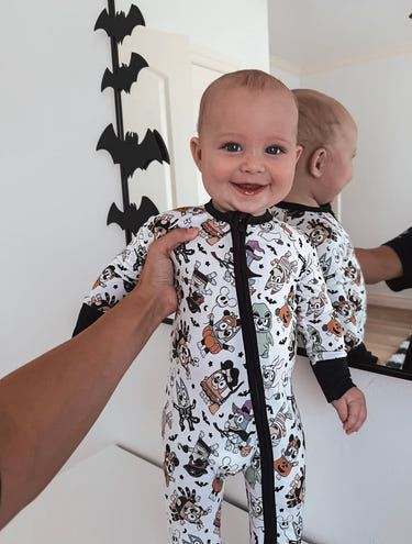 Adorable Zippy costume party zip pajamas for babies, featuring fun designs and cozy footies for playful comfort.