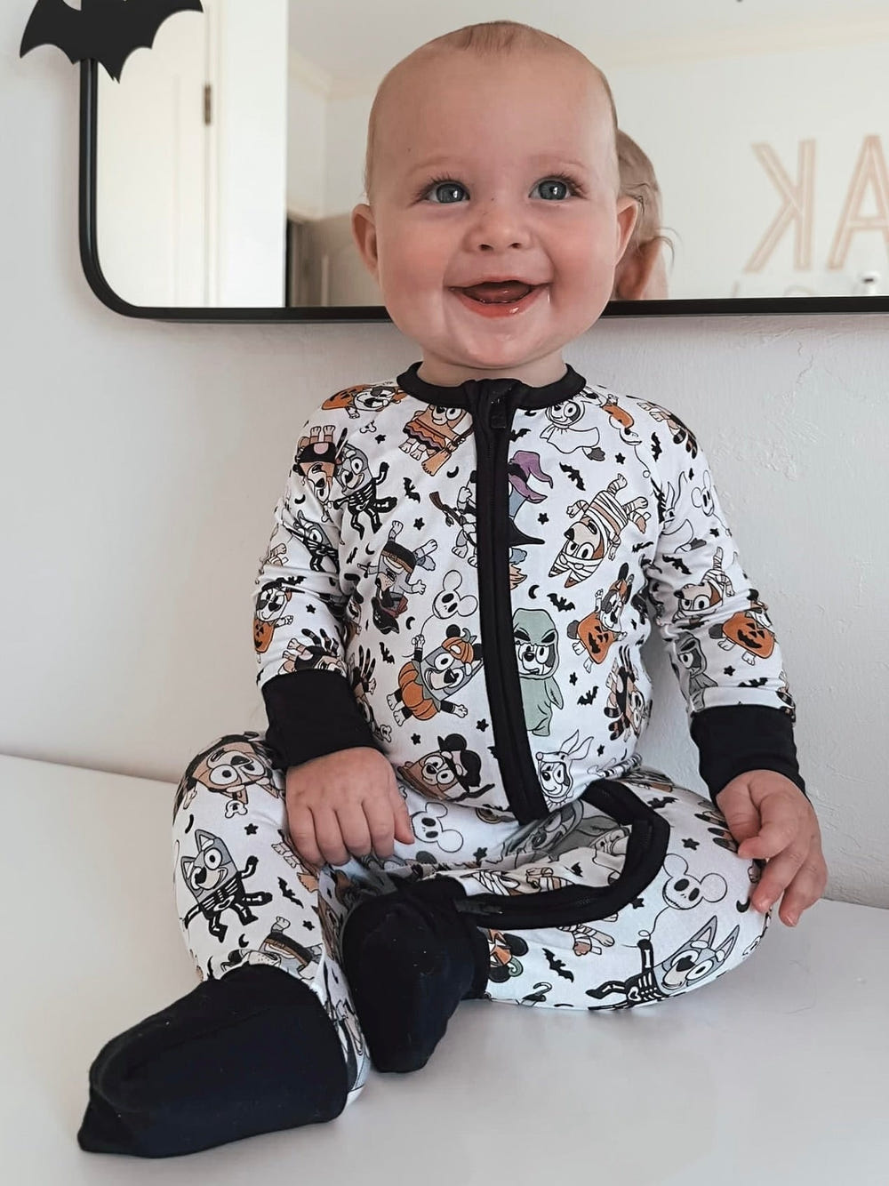 Adorable Zippy costume party zip pajamas for babies, featuring fun designs and cozy footies for playful comfort.