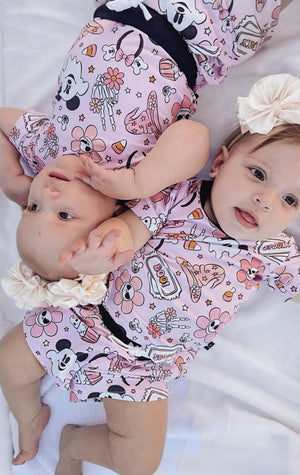 Oogie pink pocket short set for babies, perfect for playtime and comfort in toys and entertainment.