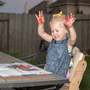 "Willow Bapron for babies in a stylish design, angled view showcasing its comfort and functionality."