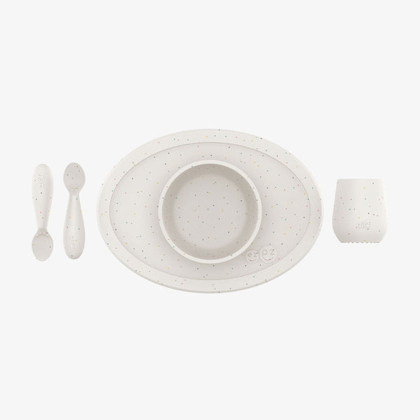 "First Foods Set for babies, featuring colorful bowls and utensils, perfect for introducing solid foods."