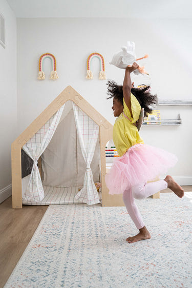 Colorful Flair Playhouse & Sensory Desk for indoor playtime and exploration. Perfect for babies and toddlers.