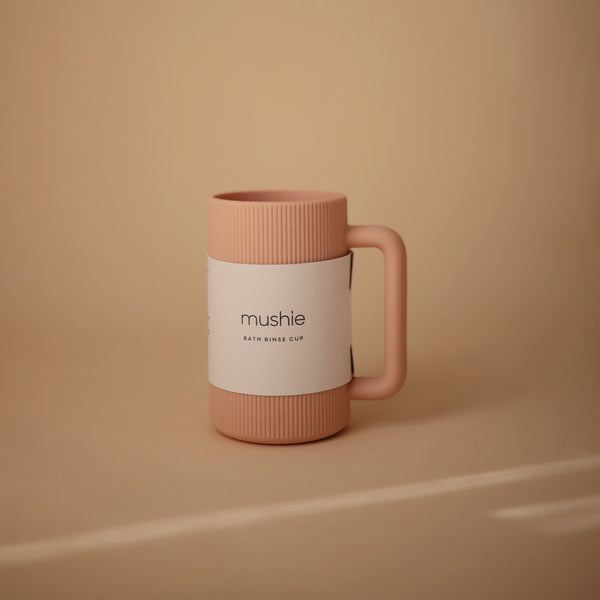 Baby bath rinse cup at a 40-degree angle, perfect for gentle rinsing during bath time.