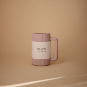 Colorful bath rinse cup for babies, designed for easy pouring and gentle rinsing during bath time.