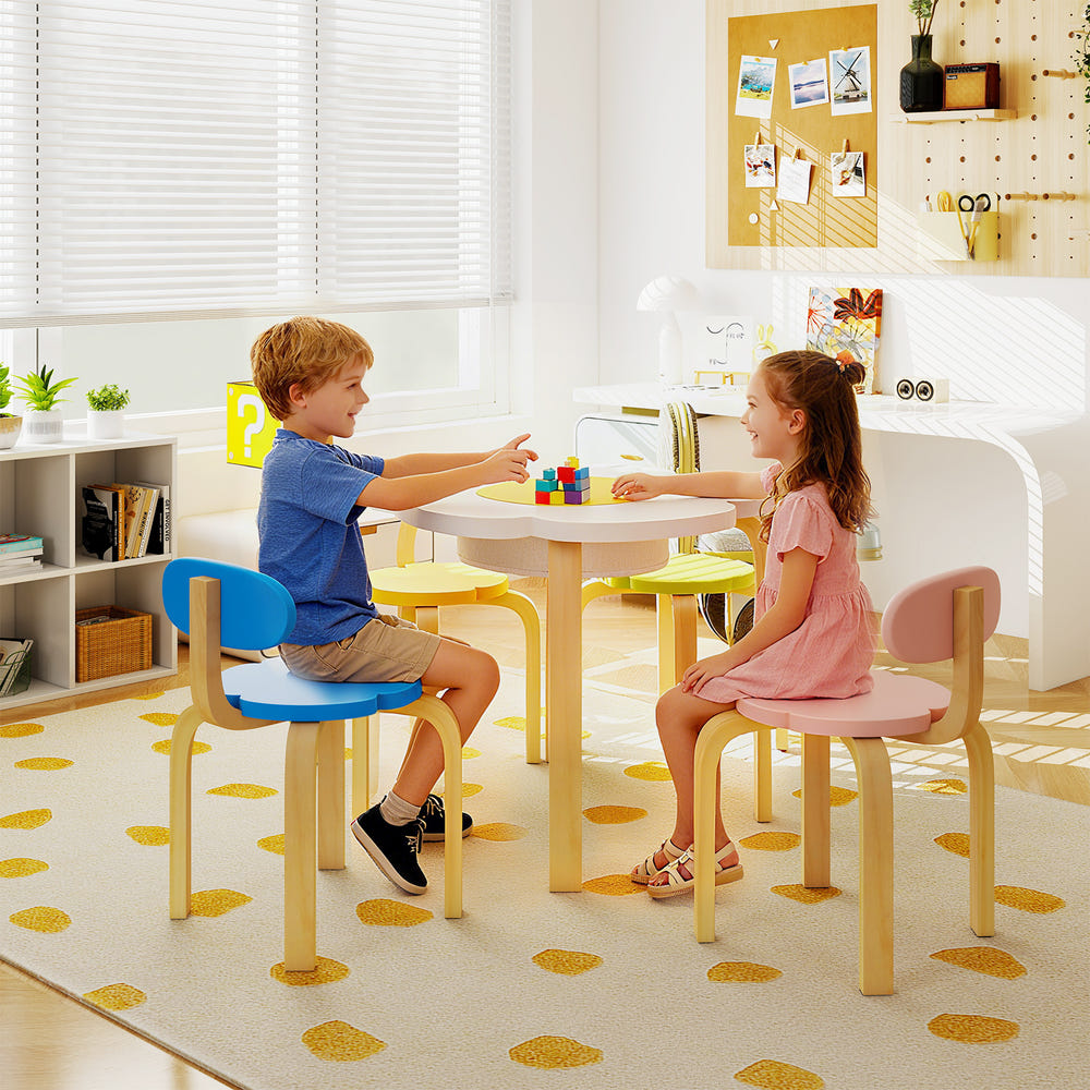 Flower-shaped wooden children table set with 2 colorful chairs and stools for play and activities.