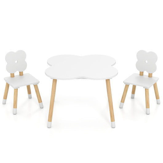 Flower-shaped kids table set with solid pine wood legs in white, viewed from angle 4. Perfect for playtime and creativity.