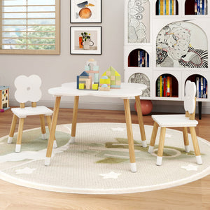 Flower-shaped kids table set with solid pine wood legs in white, perfect for playtime and learning.