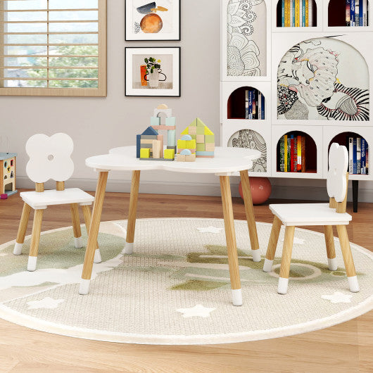 Flower-shaped kids table set with solid pine wood legs in white, perfect for playtime and learning.