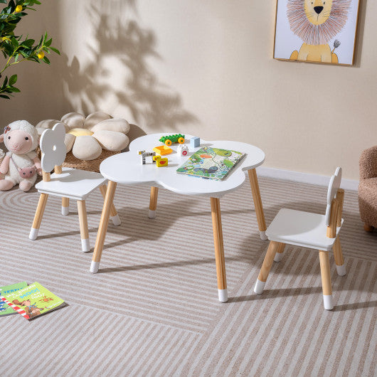 Flower-shaped kids table set with solid pine wood legs in white, viewed from angle 2. Perfect for playtime and creativity.