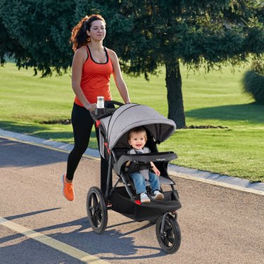 Foldable gray jogging stroller with detachable tray and air-filled rubber tires, perfect for active parents and babies.