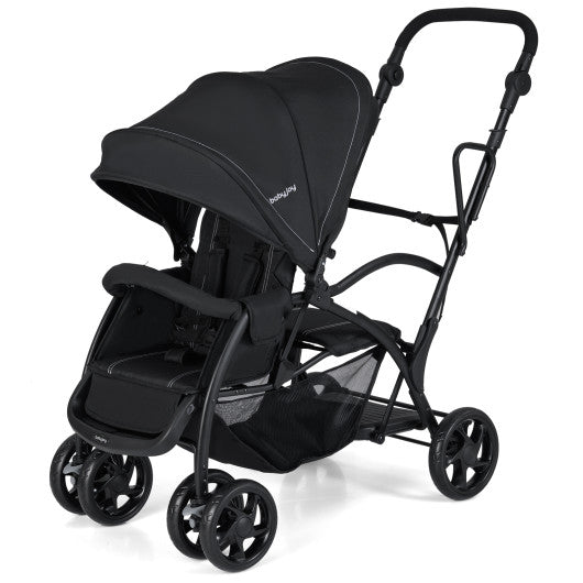 Foldable twin tandem stroller in black, featuring adjustable handlebar and sit-and-stand design, shown from angle 3.