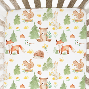 Forest Friends Fitted Crib Sheet in playful animal print, perfect for nursery bedding and linens.
