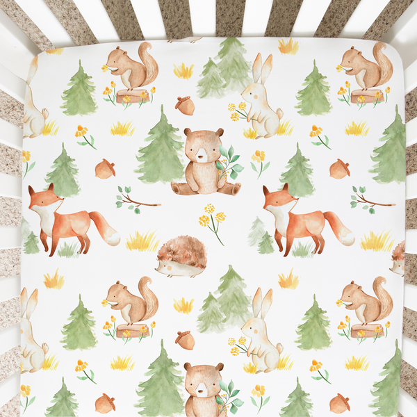 Forest Friends Fitted Crib Sheet in playful animal print, perfect for nursery bedding and linens.