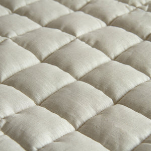 Natural French linen baby playmat at angle 5, perfect for playtime and soft surface for infants.