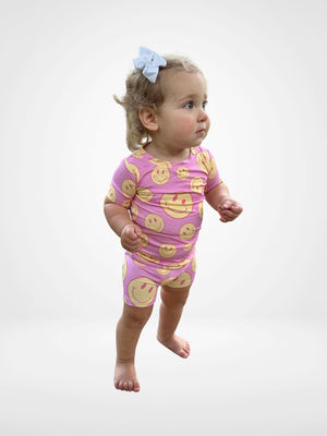 Pink Lemonade Short Set for babies, featuring a vibrant design and comfortable fit, displayed at an angle.