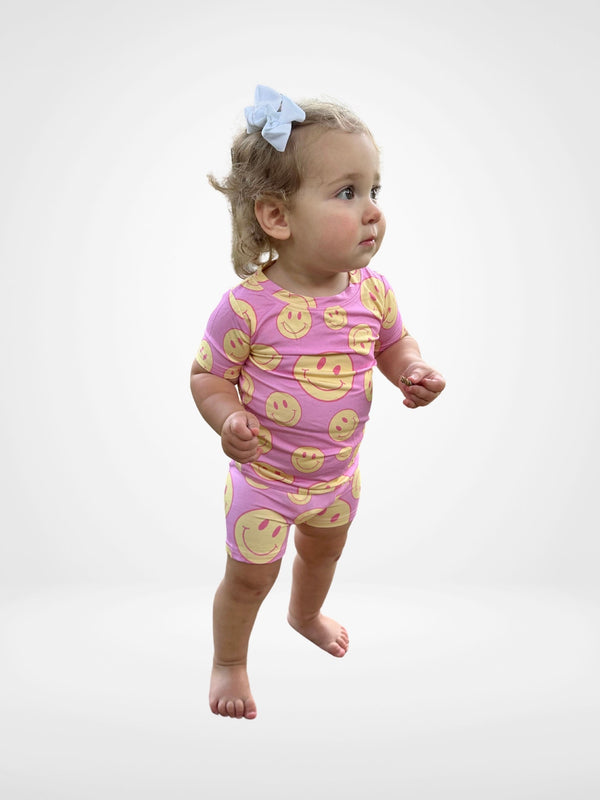 Pink Lemonade Short Set for babies, featuring a vibrant design and comfortable fit, displayed at an angle.