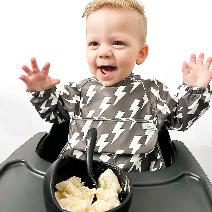 Grayson Long Sleeve Bib with Lightning Bolts design for mess-free mealtime fun for babies.