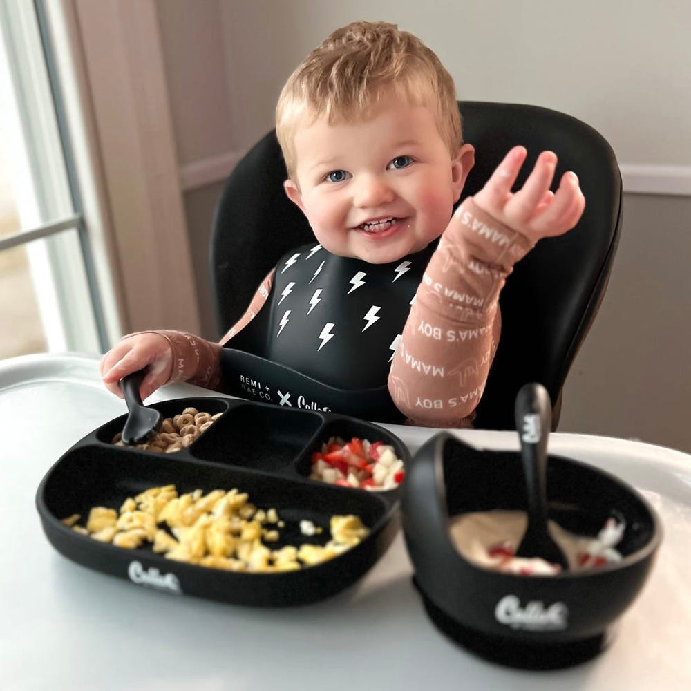 Blackout Collection 4 Section Suction Plate for baby food storage and on-the-go feeding.