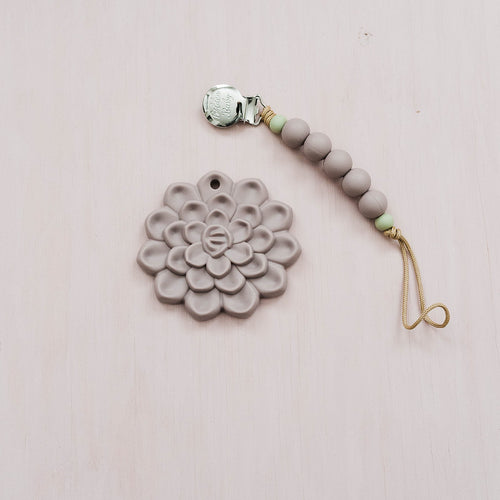"Colorful succulent teethers for babies, designed for soothing gums and safe play, angled view."