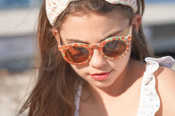 Classic sustainable sunglasses for kids aged 3-8, plant-based, bendable, polarized, shown at angle 23.