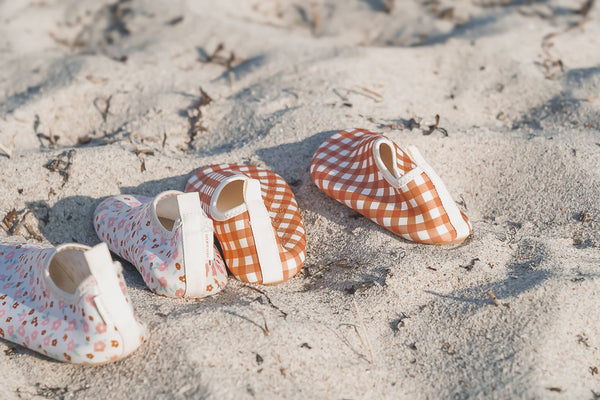 "Angle 4 view of Sunset Meadow swim shoes for babies, perfect for pool and beach fun."