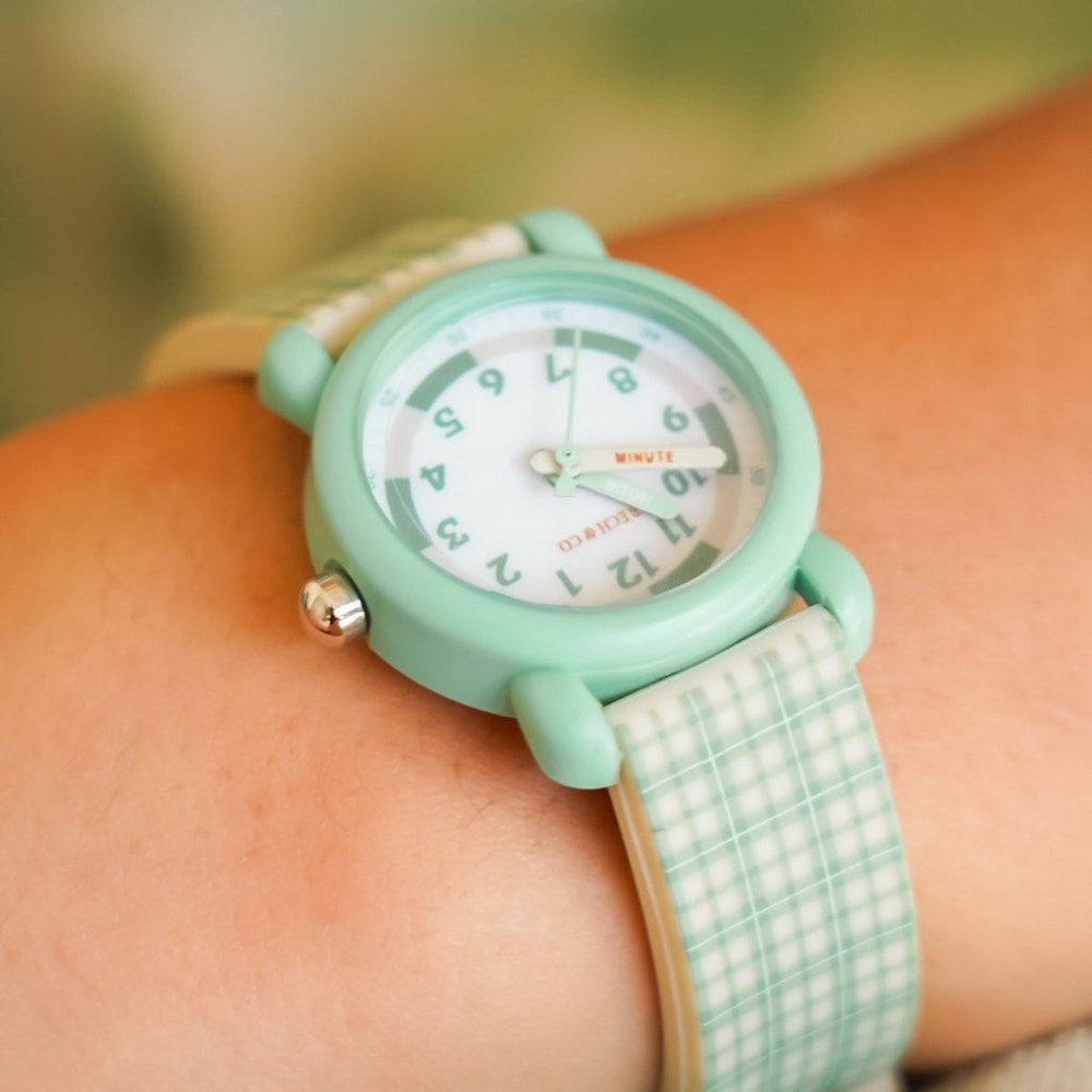 Classic watches in fern plaid design, featuring silicone and stainless steel, perfect for baby accessories.