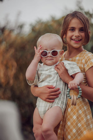 Classic sustainable baby sunglasses, plant-based, bendable, polarized for ages 0-2, shown at angle 11.