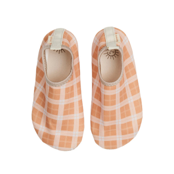 Baby swim shoes in buckwheat plaid design, perfect for summer fun and water play.