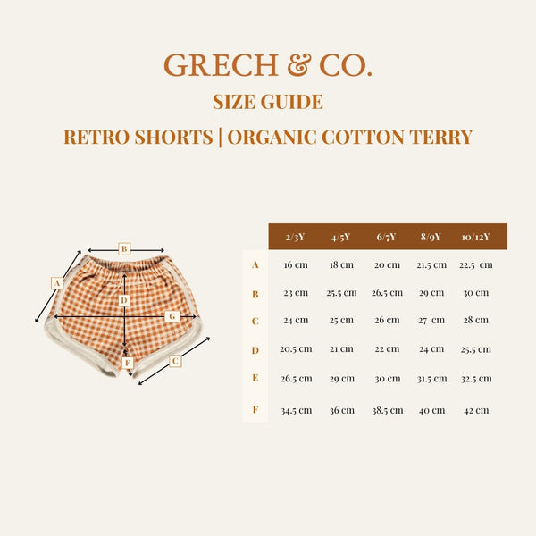 Retro organic cotton terry baby shorts in Sunset Meadow design, angle 8 view. Perfect for stylish comfort.