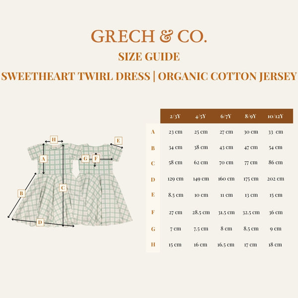 Sweetheart Twirl Dress in Buckwheat Plaid, organic cotton jersey, perfect for baby swimwear. Angle 11 view.