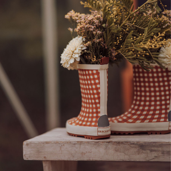Classic Sienna Gingham rain boots for babies, angled view showcasing stylish design and vibrant colors.