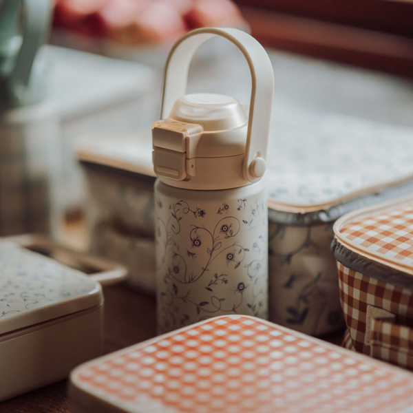 Sip + Chug 2 in 1 Thermo Water Bottle 12 oz. in Scandi Floral design, showcasing angle 2 view.