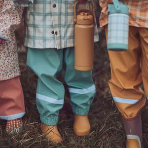Sip + Chug 2 in 1 Thermo Water Bottle 24 oz. in Buckwheat color, shown at angle 4, perfect for babies and toddlers.