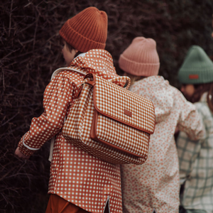 Sienna Gingham satchel backpack for babies, stylish and functional, shown from angle 2.