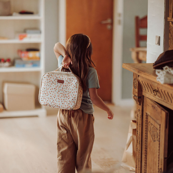 Insulated Lunch Bag in Sunset Meadow design, angled view showcasing vibrant colors and spacious interior.
