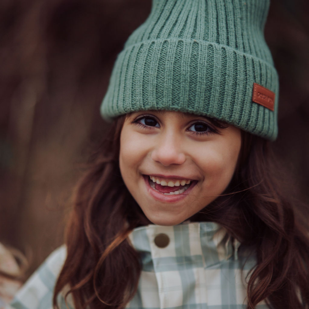 Knit Beanie Wide Rib in Fern color for babies, soft and stylish headwear for little ones.