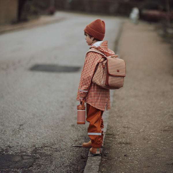 Knit Beanie Wide Rib in Sienna color, showcasing a stylish angle view for babies. Perfect for warmth and fashion.