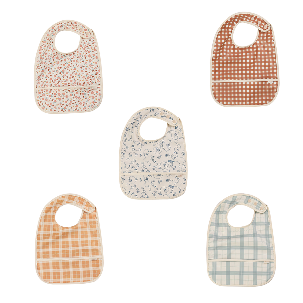 Basic Bib in Fern Plaid design, perfect for keeping your baby clean during mealtime.