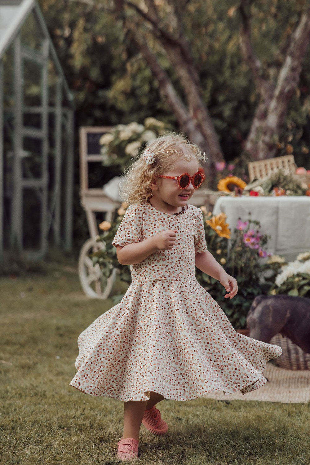 Sweetheart Twirl Dress in Sunset Meadow, organic cotton jersey swimwear for babies.