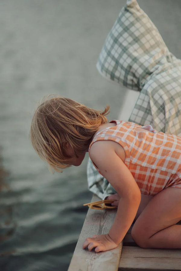 Sweetheart 1 Piece Swimsuit in Buckwheat Plaid, UPF protected, eco-friendly fabric, angle view.