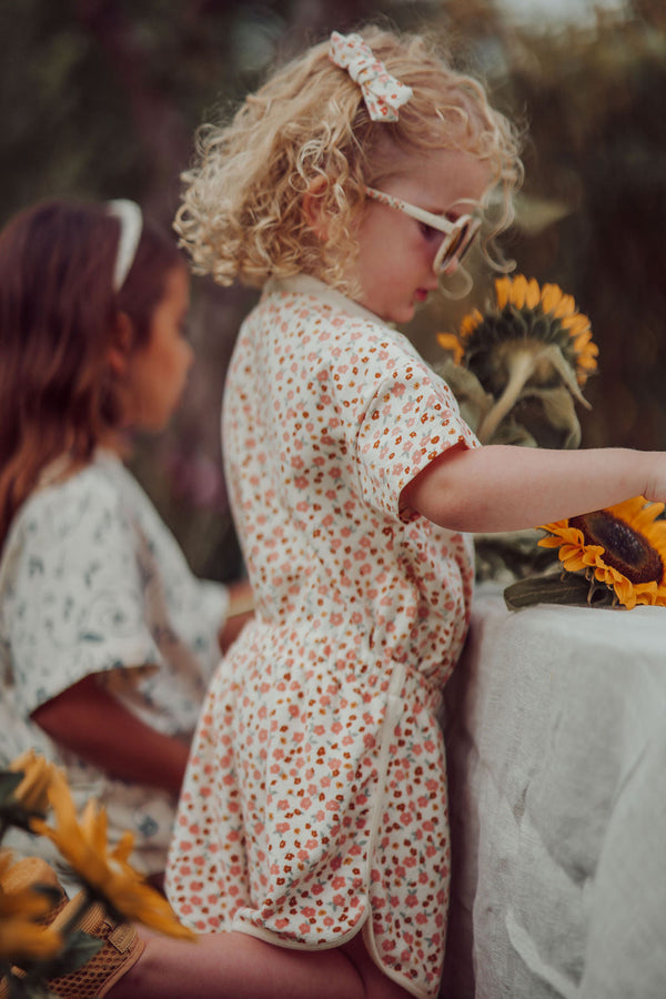Oversized organic cotton t-shirt in Sunset Meadow design, perfect for babies, shown from angle 6.