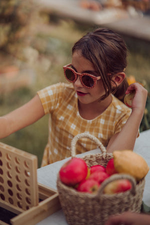 Classic sustainable sunglasses for kids aged 3-8, plant-based, bendable, and polarized, shown at angle 8.